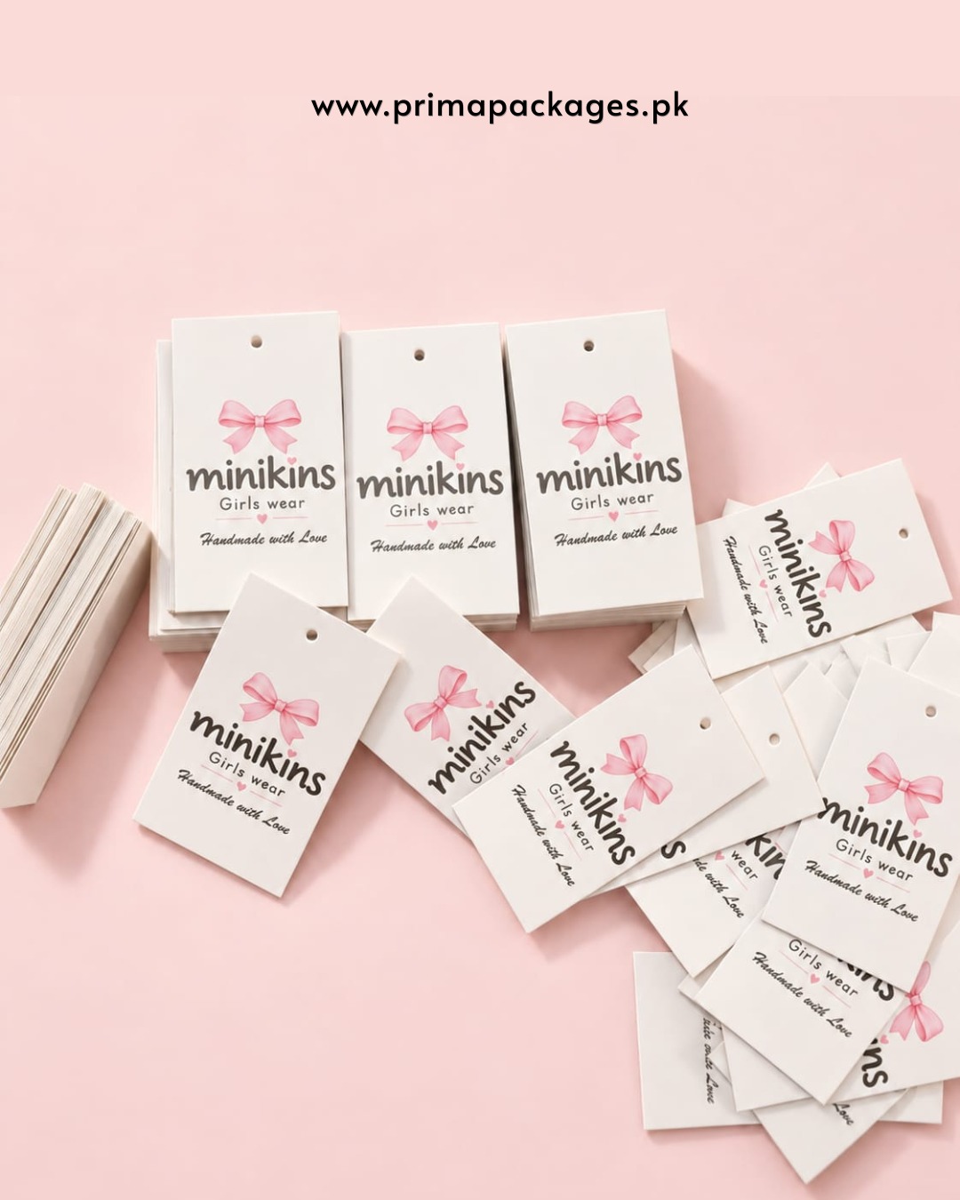Custom pink and cream Minikins hang cards made by Prima Packages