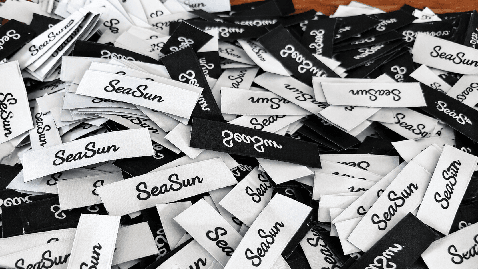 Prima Packages - Custom Woven Labels Production & Flatlay